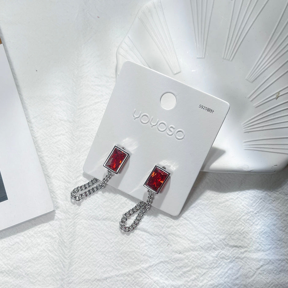 Orecchini a catena con cristalli di rubino