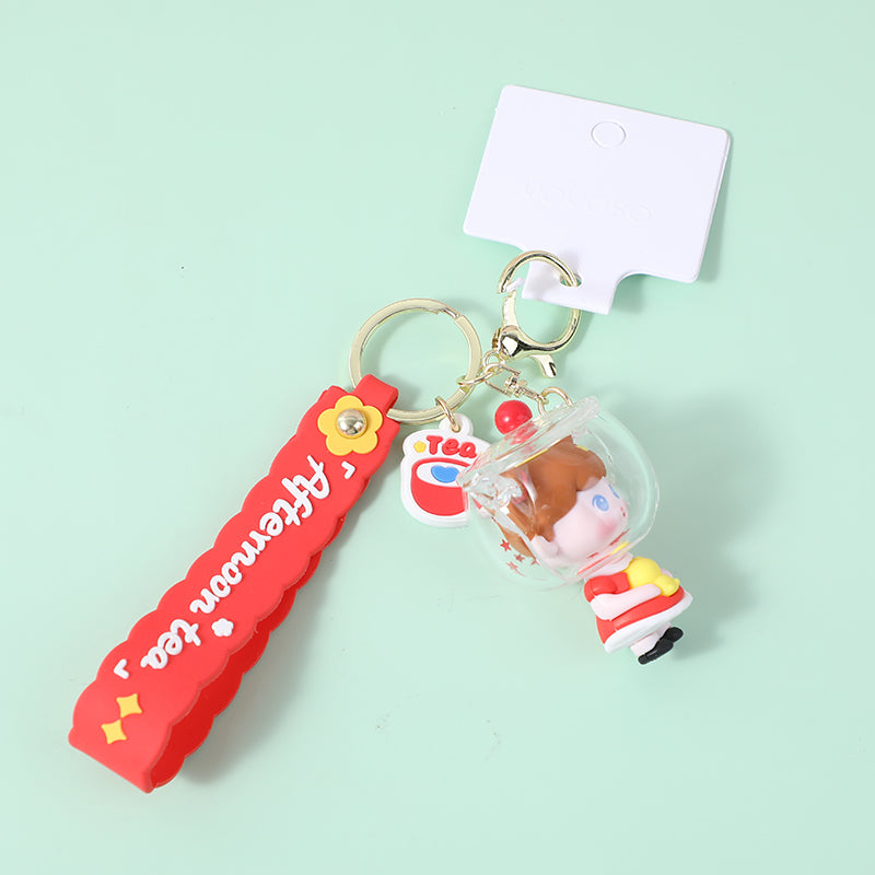 Ragazza del tè pomeridiano in anatra con portachiavi in corda