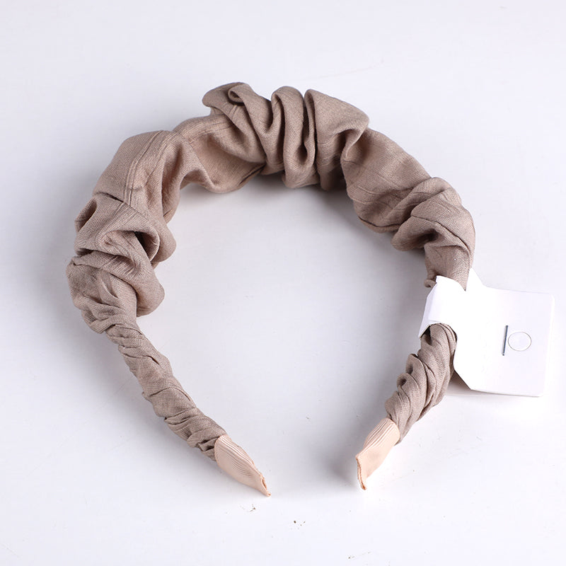 Cerchietto per capelli plissettata in tessuto