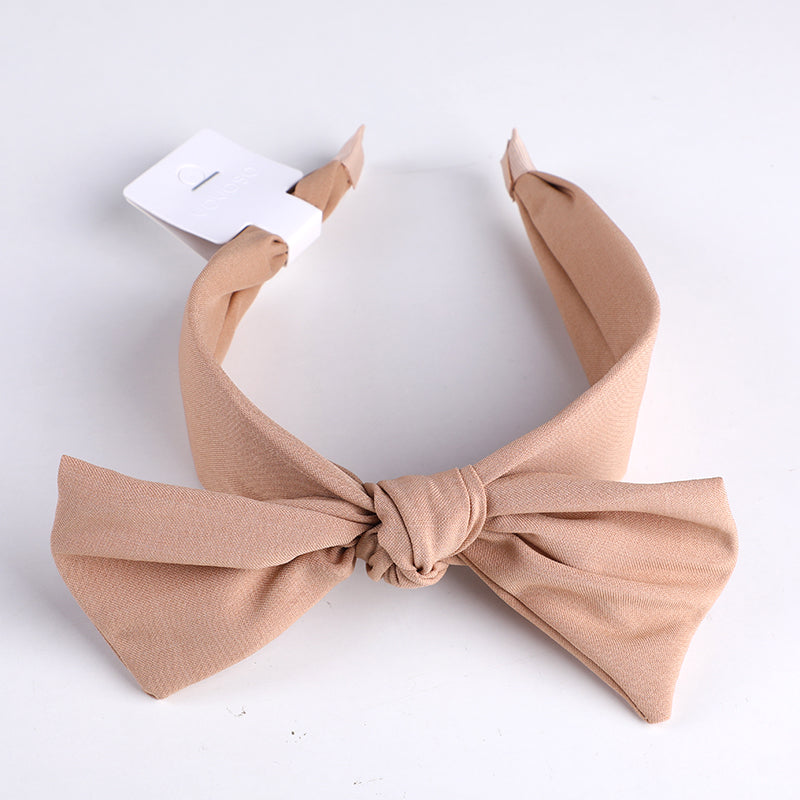 Cerchietto per capelli con orecchie in tessuto monocromatico