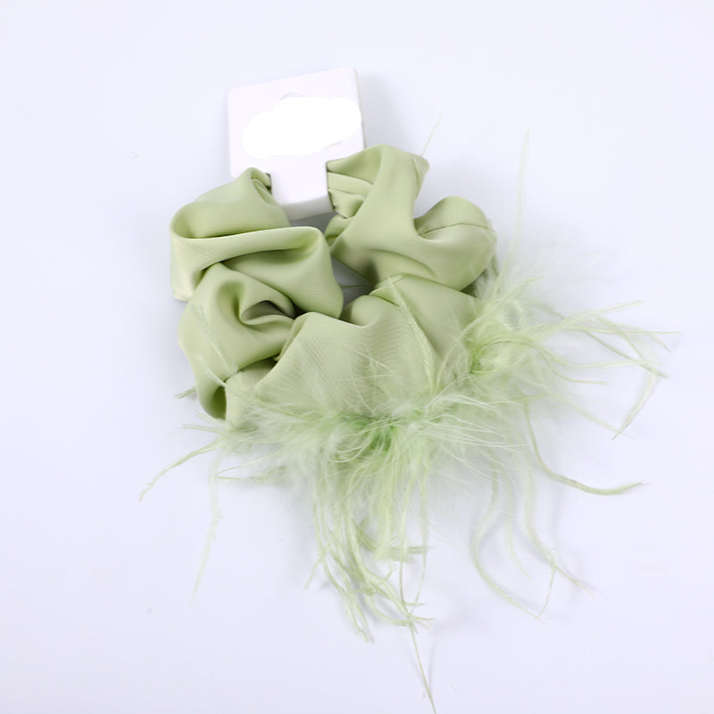 Elegante elastico per capelli verde