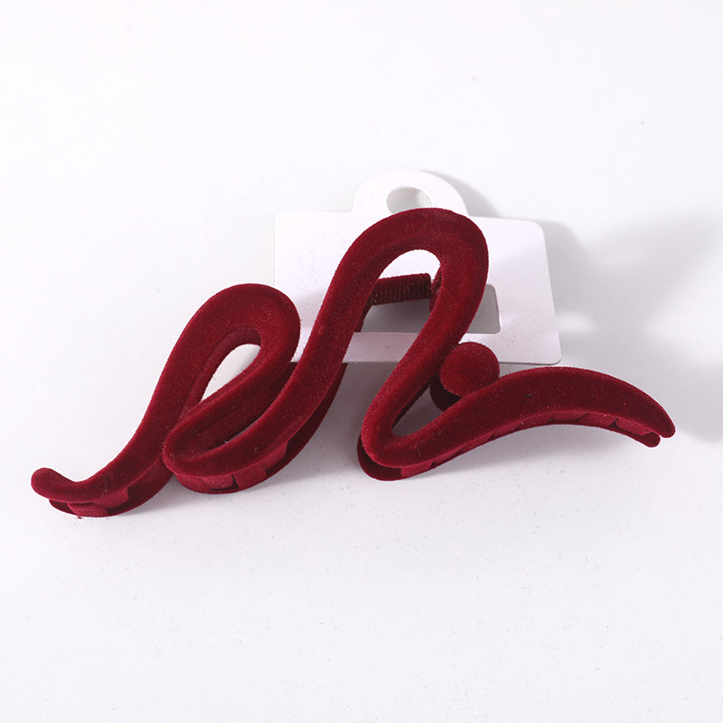 Fermaglio per capelli a fiocco ondulato