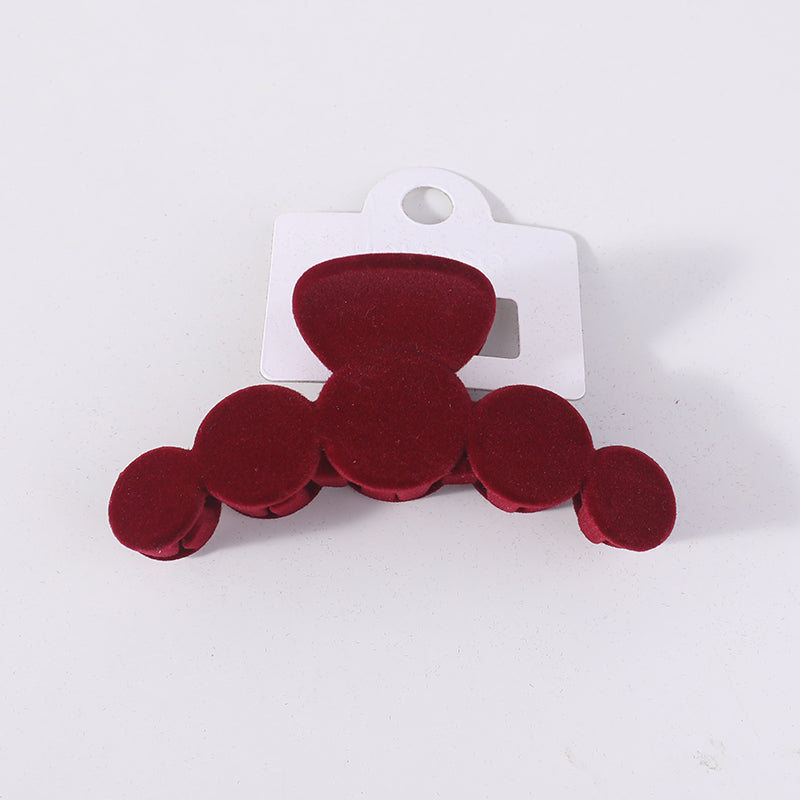 Fermaglio per capelli rotondo in floccato