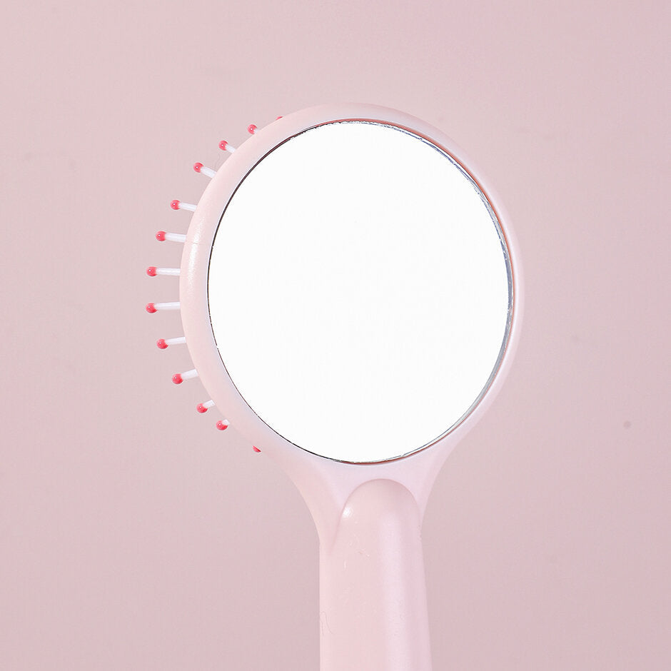 Pettine a specchio del piccolo dinosauro principe che cambia colore