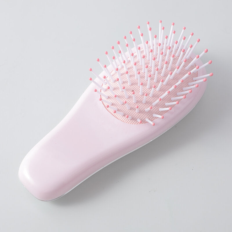 Pettine airbag per il massaggio galvanico carino e paffuto