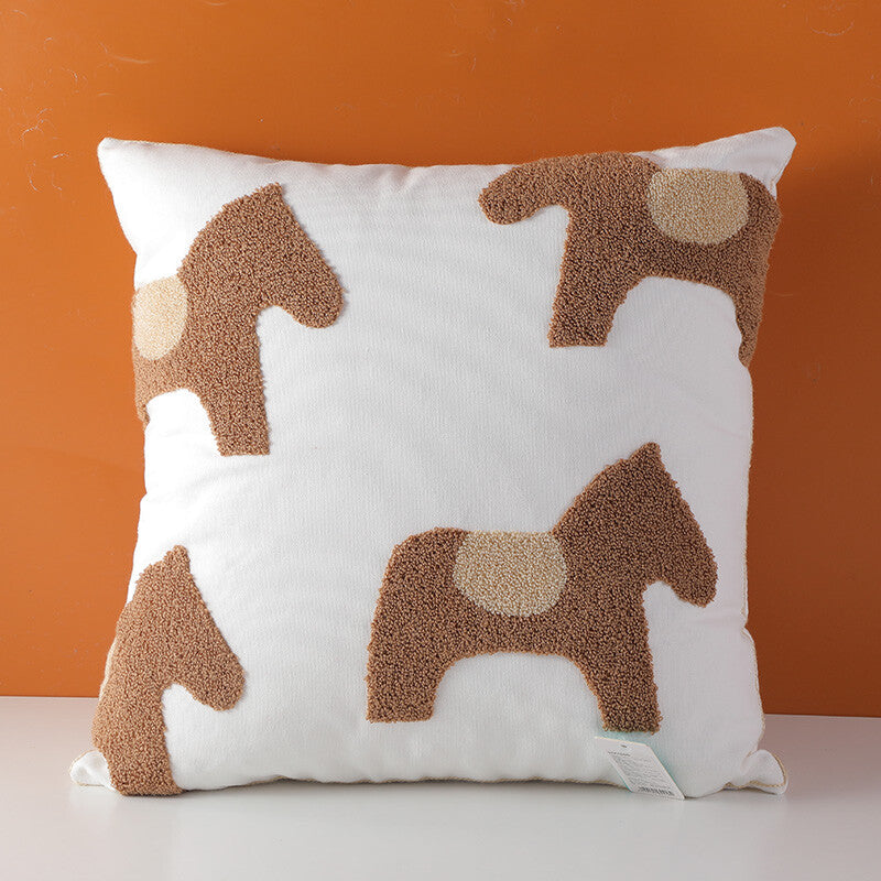 Cuscino da lancio in cavallino ricamato con semplicità nordica