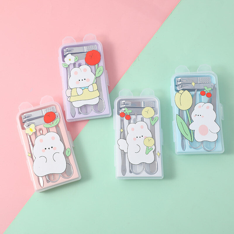 Set di sette pezzi di manicure con coniglio e testa d'orso