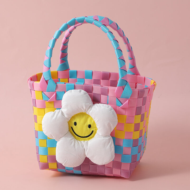 Cestino di fiori con faccina sorridente