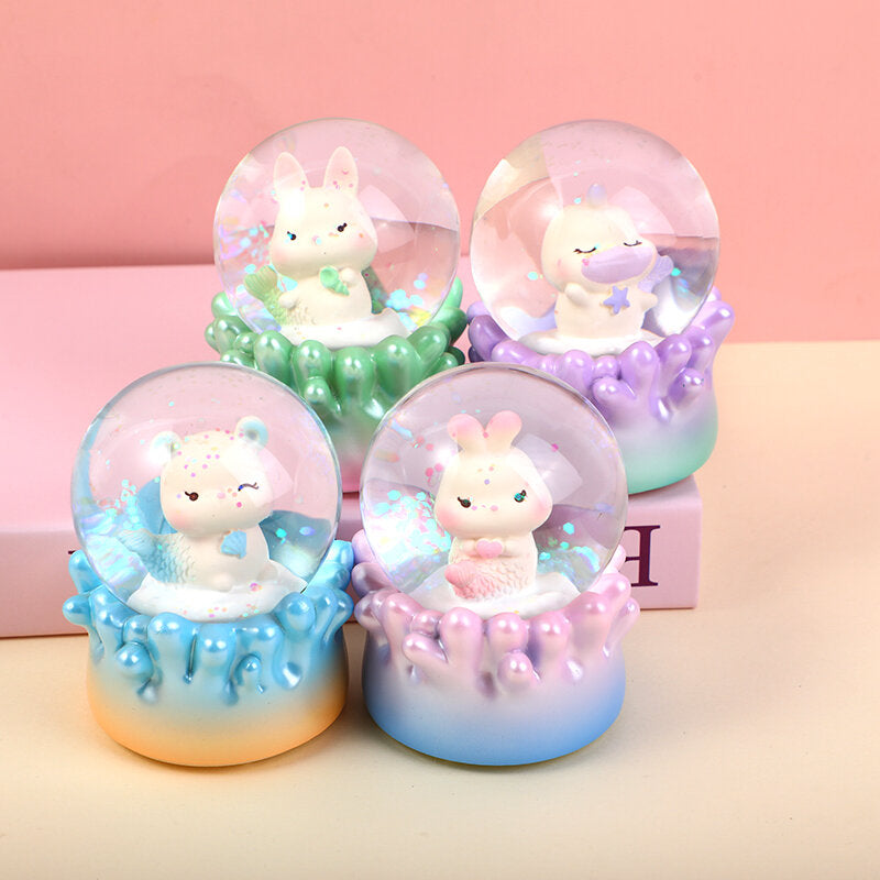 Globo di neve con luce che scuote la mano del mare di corallo #65