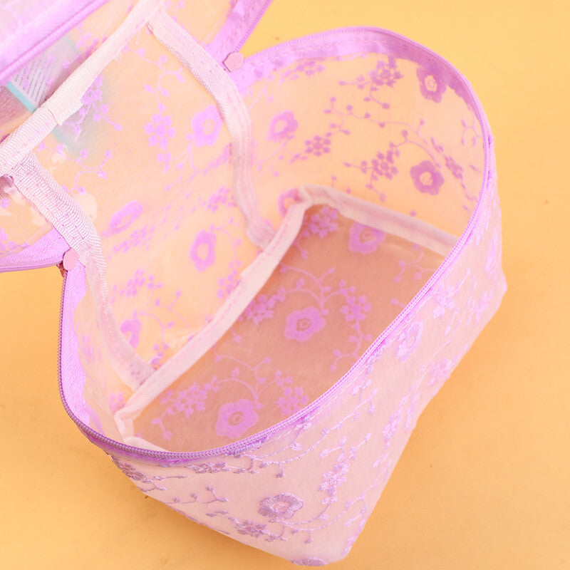 Borsa per il trucco a forma di secchiello con fiori di ciliegio viola