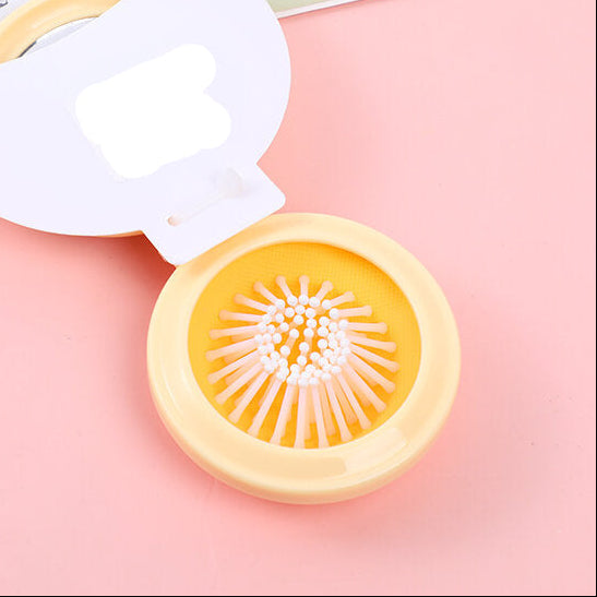 Pettine pieghevole a cuscino d'aria serie Big-eyed con specchio