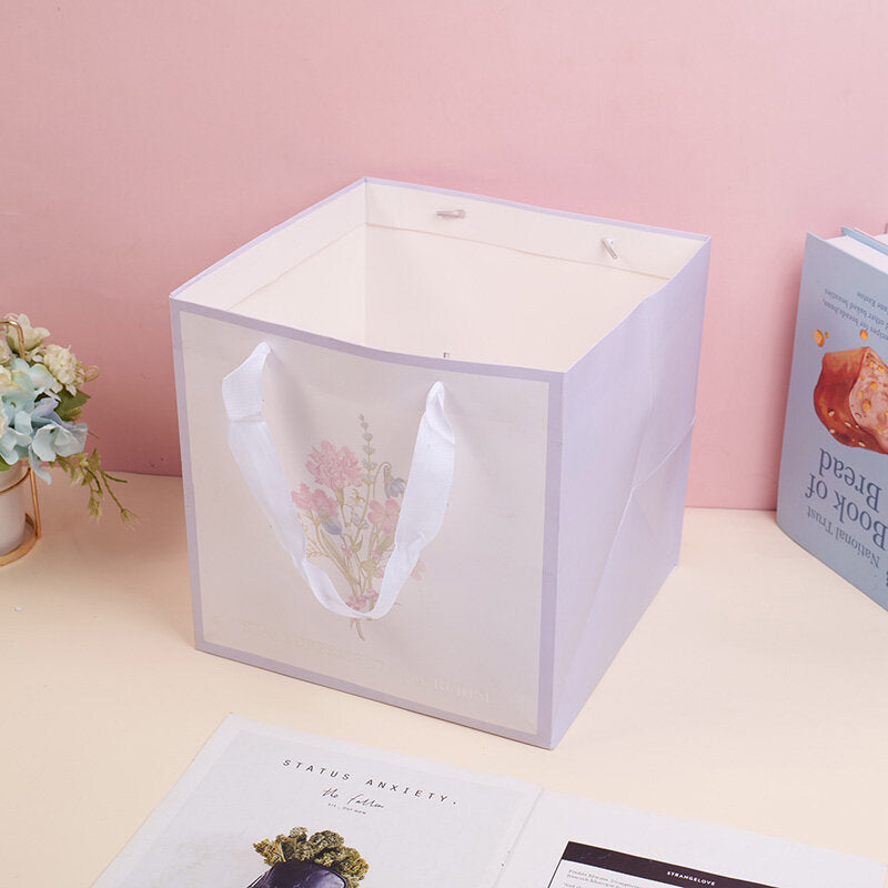 Borsa regalo a fondo largo con fiori della serie viola-L