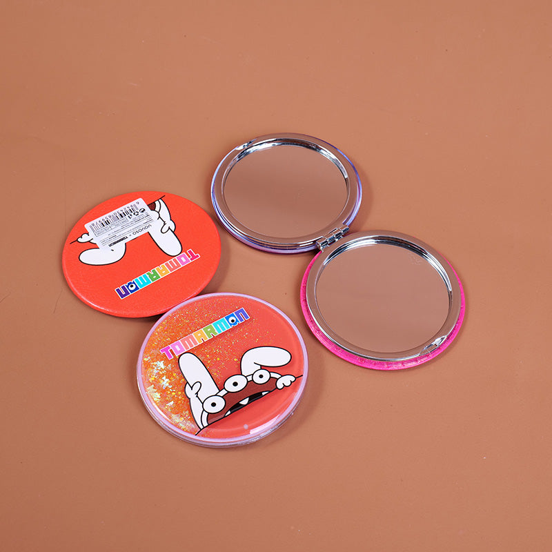 Specchio rotondo in rilievo con motivo sabbie mobili della serie TOMARMON