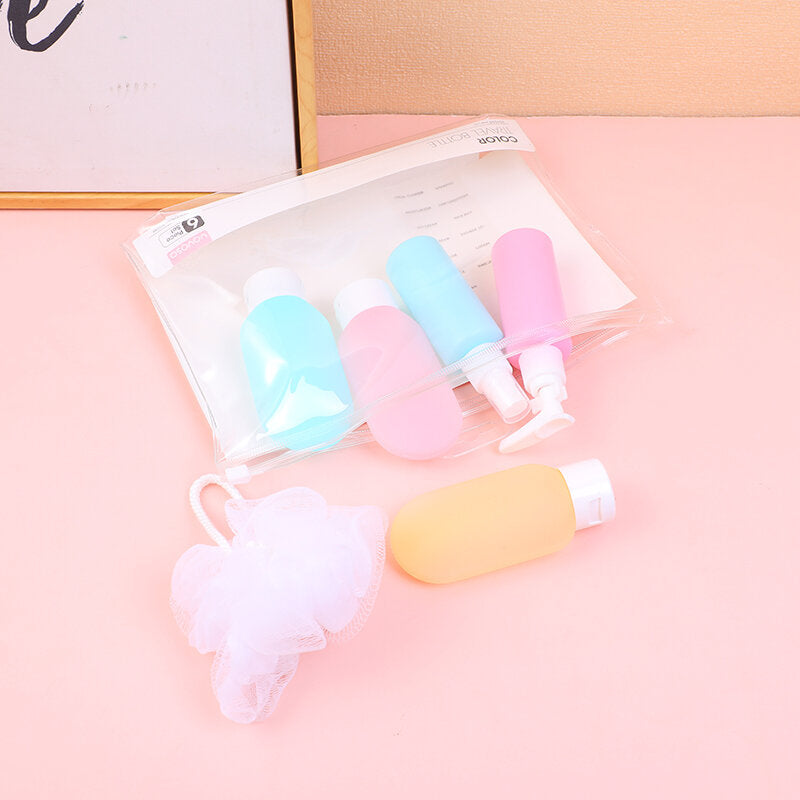 Set di 6 bottiglie da viaggio colorate (inclusa spugna da bagno)