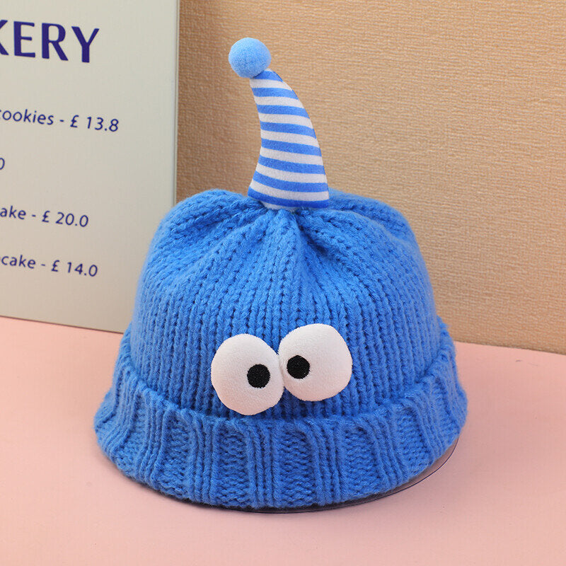 Cappello lavorato a maglia per bambini con grandi occhi-blu