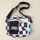 Borsa a tracolla con tasca a scacchi - nero