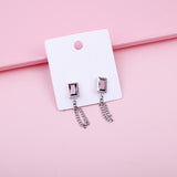 Orecchini a catena con cristalli di rubino