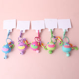 Portachiavi a forma di mostro con il broncio