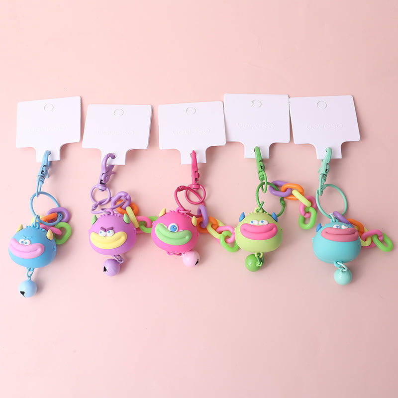 Portachiavi a forma di mostro con il broncio