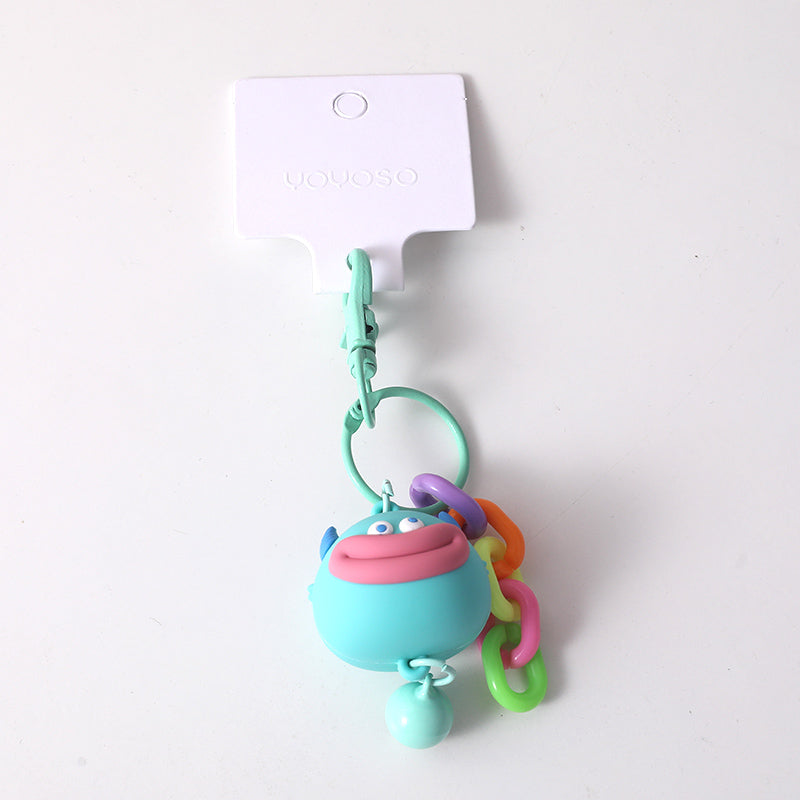 Portachiavi a forma di mostro con il broncio