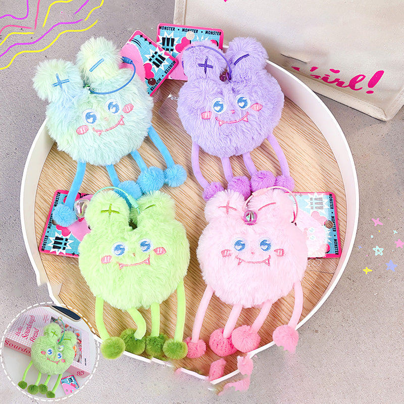 Piccolo mostro di neve con gambe lunghe ciondolo in peluche