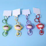 Portachiavi con fibbia a strappo facile - bambola con tre occhi