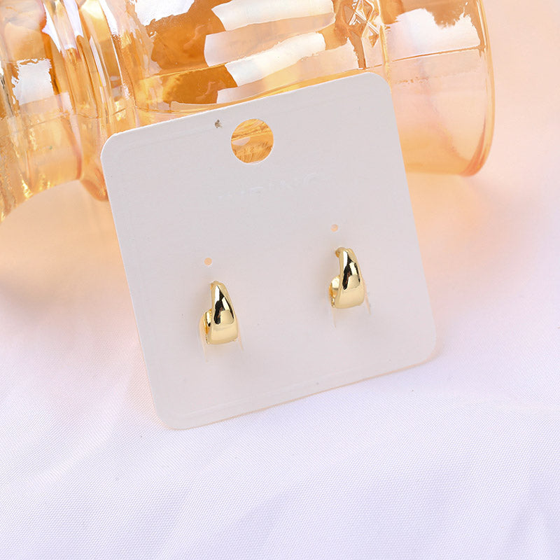 Orecchini in perline d'oro di colore puro