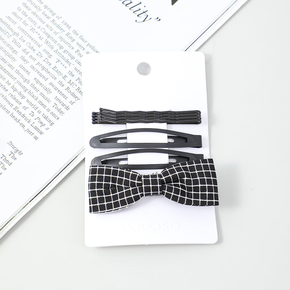 Fermaglio nero a forma di papillon 4 pz