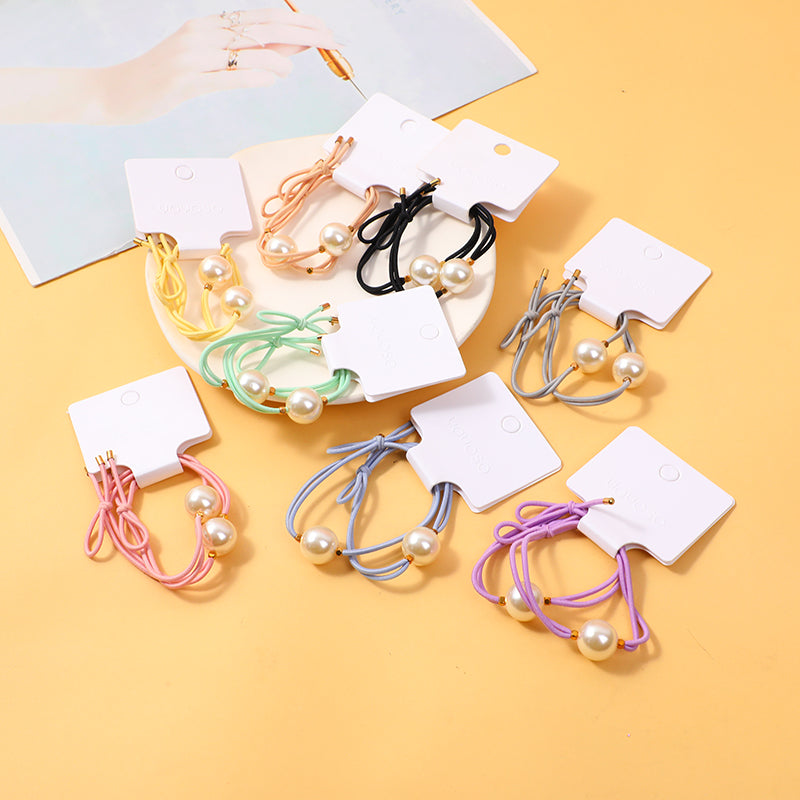 Cordoncino per capelli con riflessi dilati - 2 pz