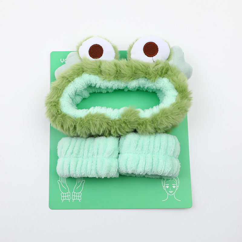 Set combinato di fascia per capelli e polsiere a forma di rana