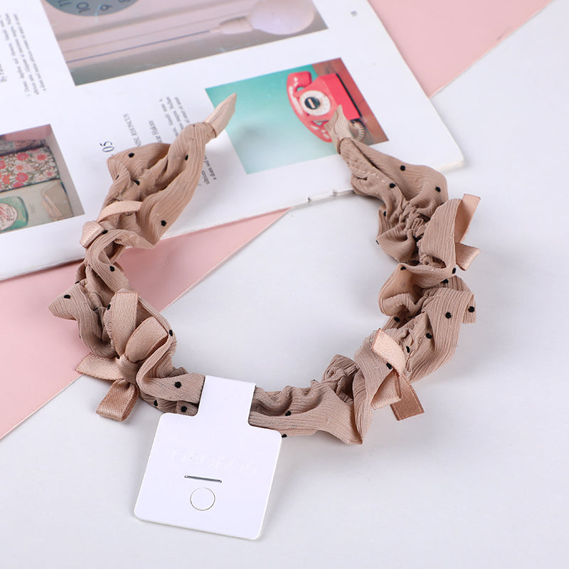 Cerchietto per capelli con nodo a fiocco a pois