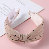 Cerchietto per capelli con orecchie a pallini