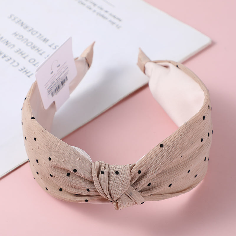 Cerchietto per capelli con orecchie a pallini