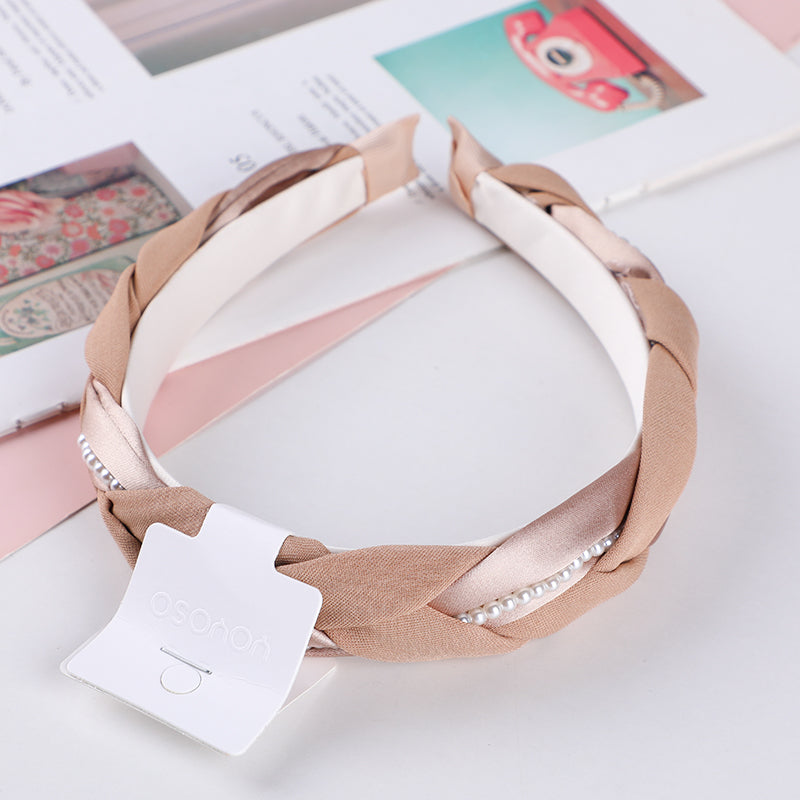 Cerchietto per capelli con treccia in tessuto monocromatico