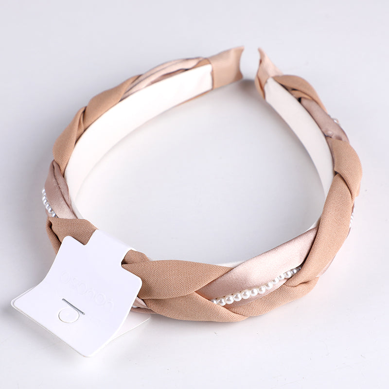 Cerchietto per capelli con treccia in tessuto monocromatico