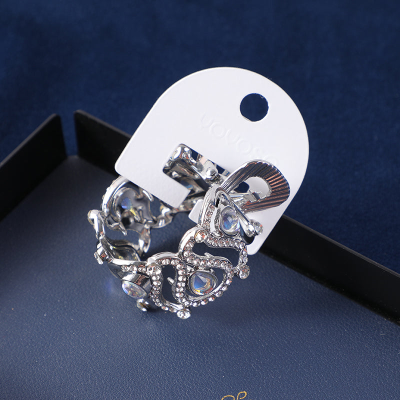 Fermaglio Tondo in Lega con Dettagli in Vetro Intrecciato