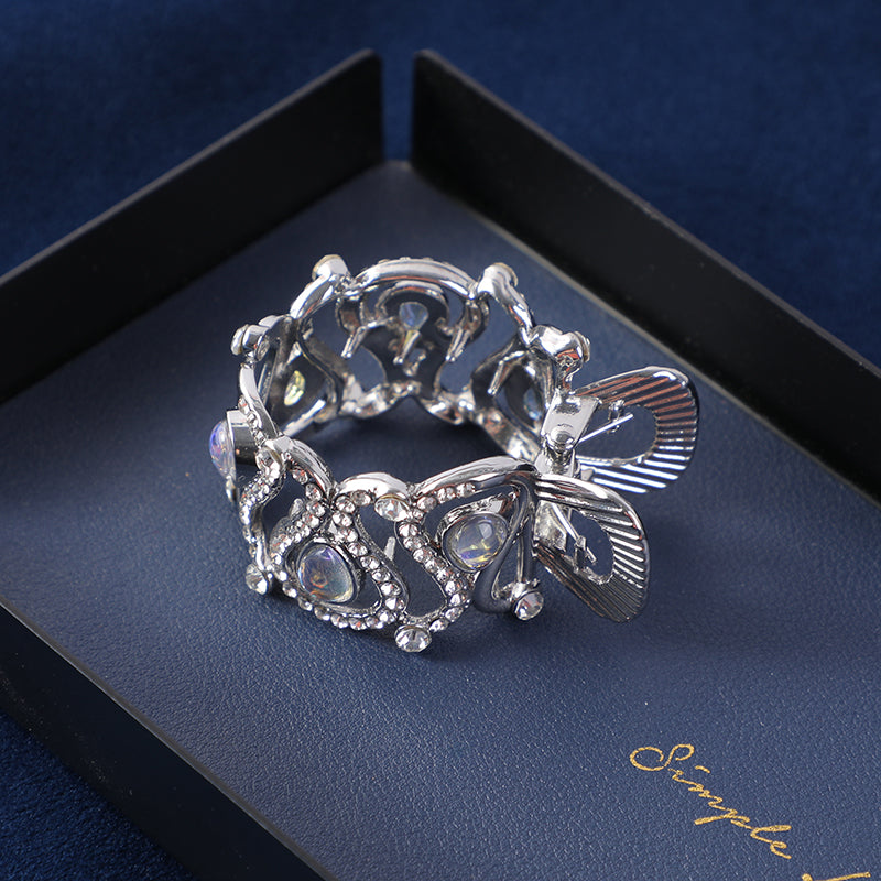 Fermaglio Tondo in Lega con Dettagli in Vetro Intrecciato