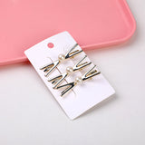 Fermaglio per capelli in lega con croce di perle