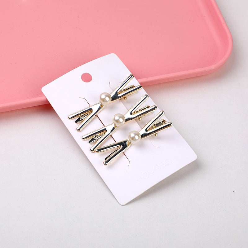 Fermaglio per capelli in lega con croce di perle