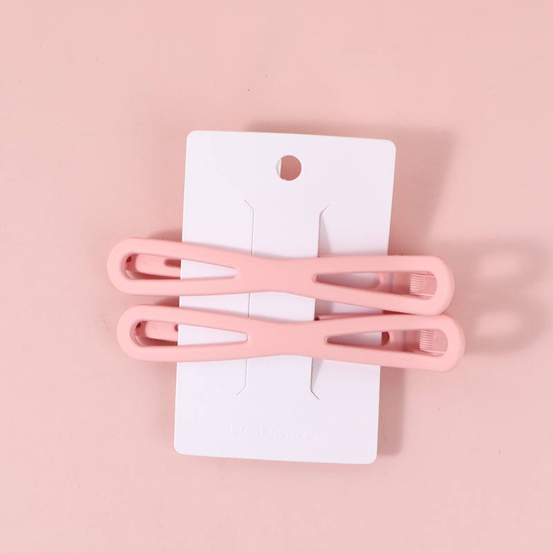 Fermaglio per capelli regolare incrociato