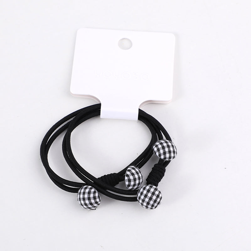 Elastico a bottoni plaid