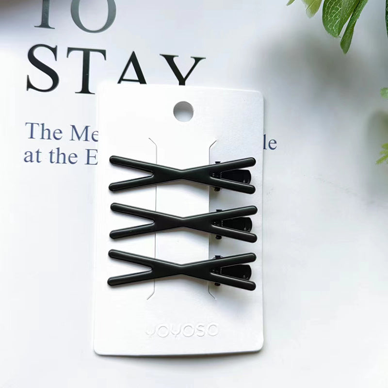 Fermaglio a Becco d'Anatra Nero Incrociato