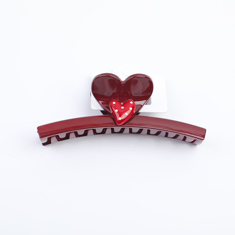 Fermaglio acrilico con punti incrociati