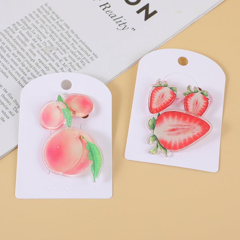 Set di mollette ed elastici alla frutta