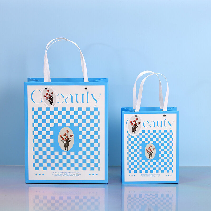 Busta regalo verticale con campanello a vento blu S