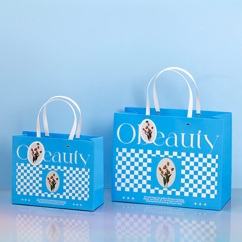 Borsa regalo orizzontale con campana a vento blu S