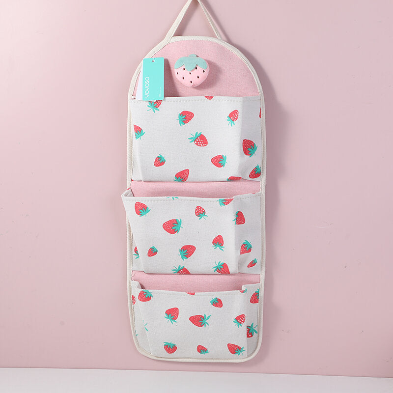 Borsa appesa alla fragola color crema con tre tasche