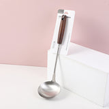 Mestolo smerigliato con manico in legno antico