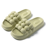 Pantofola da donna verde con motivo a bolle d'aria misura 38-39