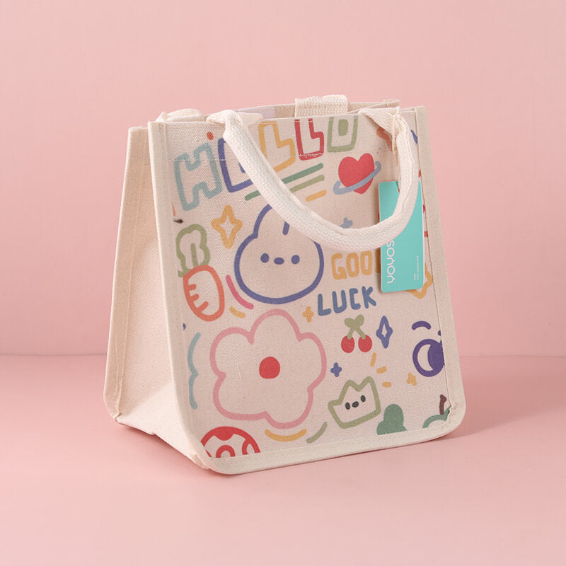 Trapezoid handbag with large green stripes